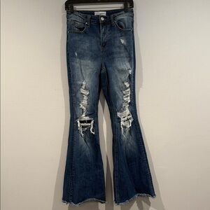 Risen Distressed Flare Jeans in Blue